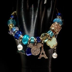 Elegant Blue and Gold Charm Bracelet